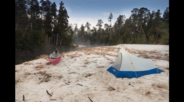 Pitching a tent on one of the sandbars located in front of a shelter is also an option.