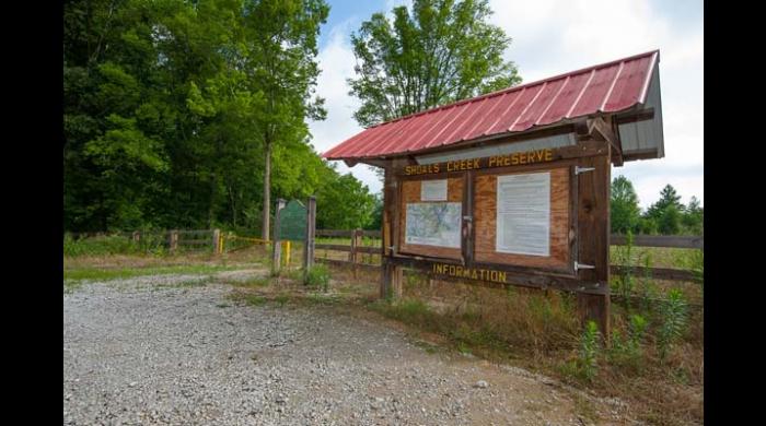 Parking area and kiosk at Shoal Creek Nature Preserve